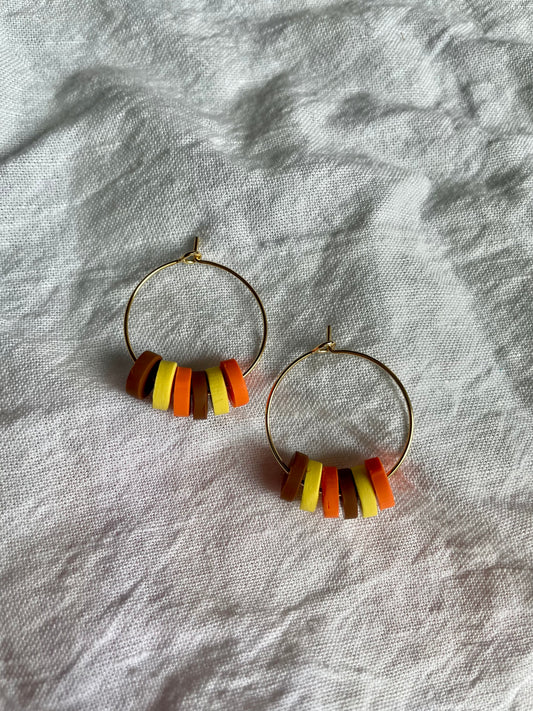 Orange, yellow, and tan hoops