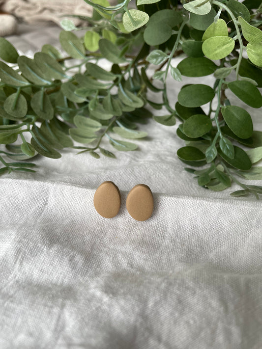 Tan pebble studs