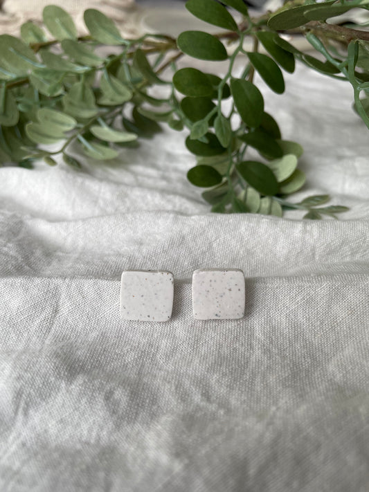 White speckled square studs